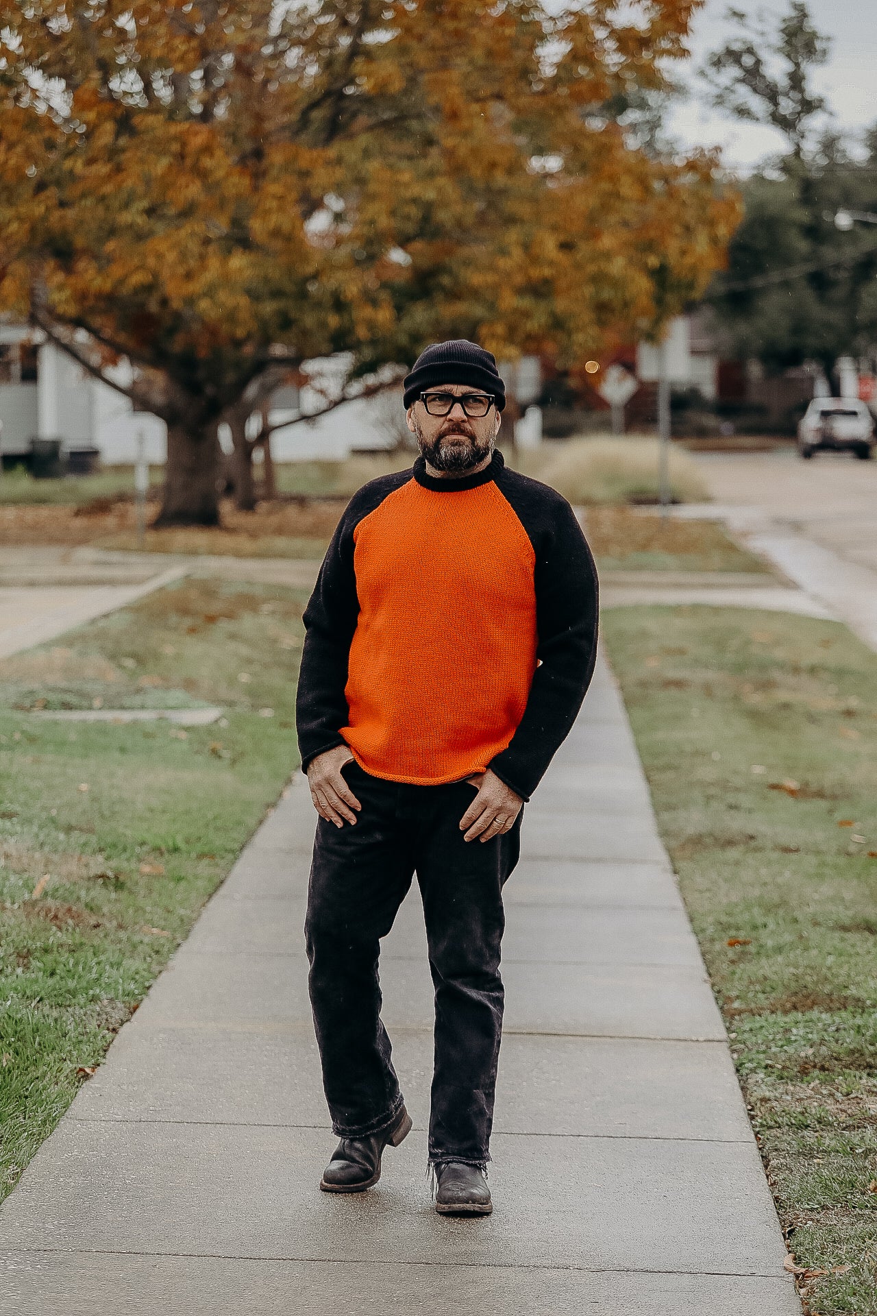 Orange shop black sweater